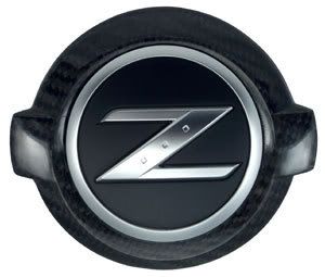 Nissan 350z front emblem removal #5