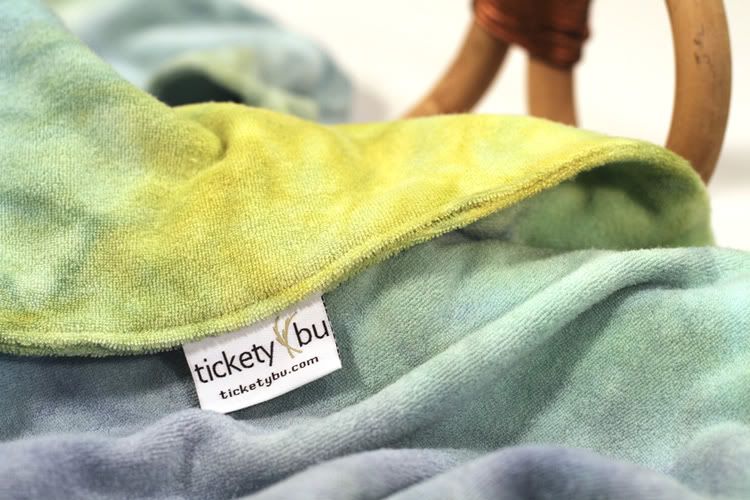 A Beautiful Tail Transforms the Bird<br>Tickety Bu Hooded Towel<br>Peacock