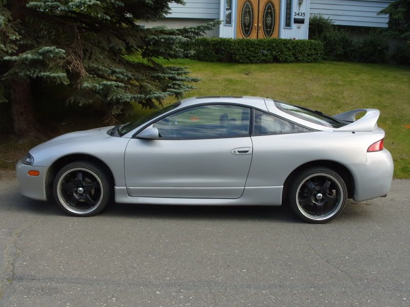 1999 Mitsubishi Eclipse GSX Engine: AWD, turbo, A/T Exterior: Mystery rims.