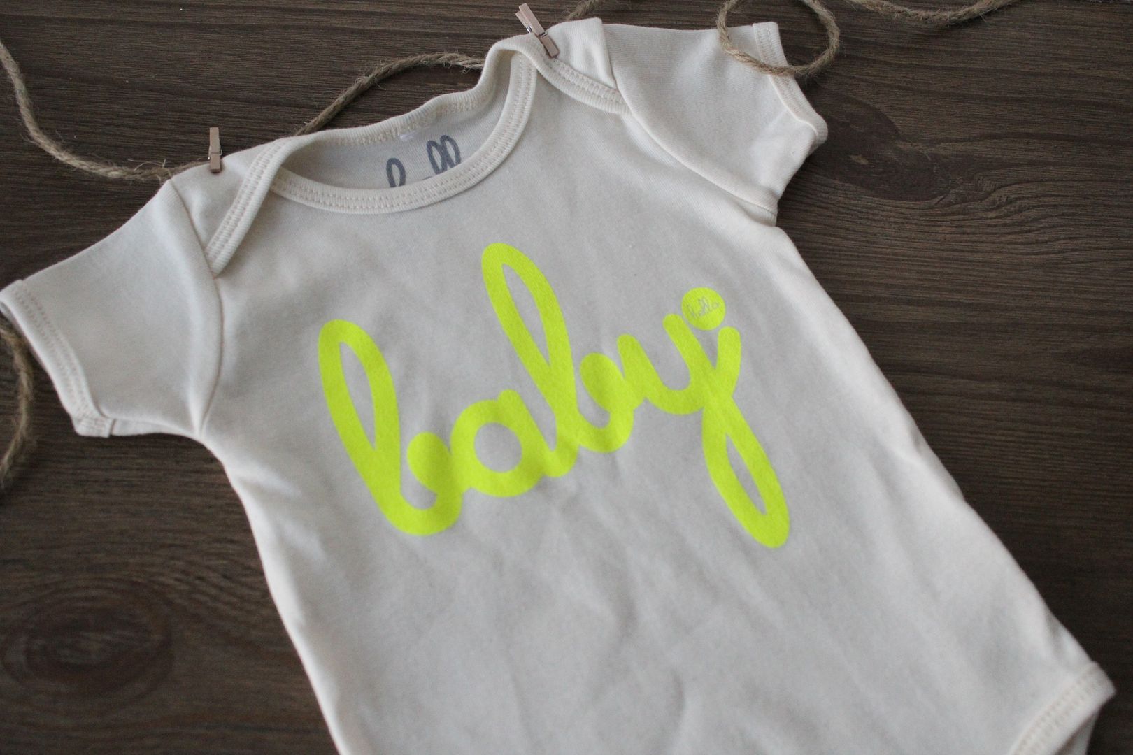 Pregnancy Announcement via Stilettos and Diapers