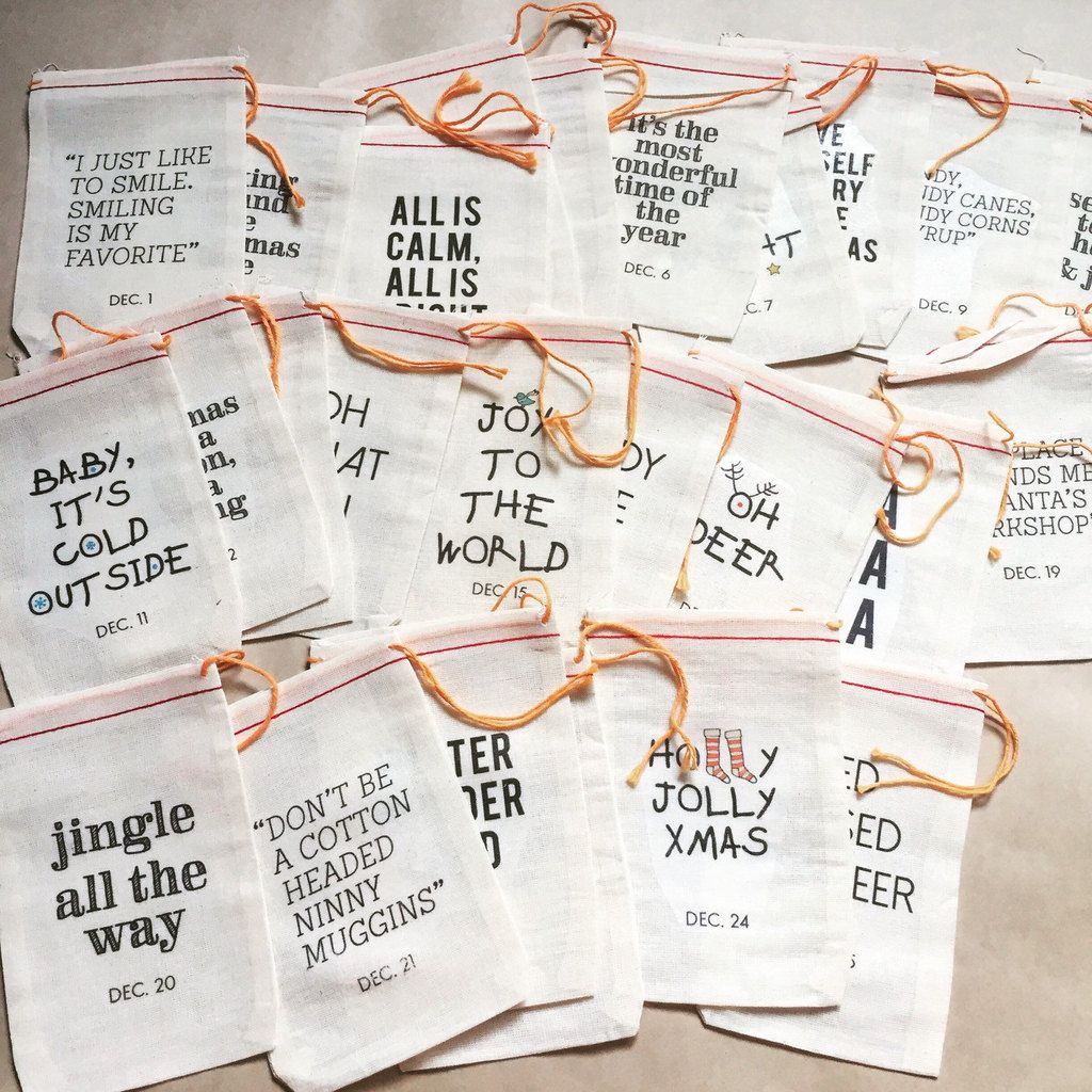 Coolest Advent Calendars: Typographic muslin bags each with a quote from the Elf movie! | Gold Tinsel Shop