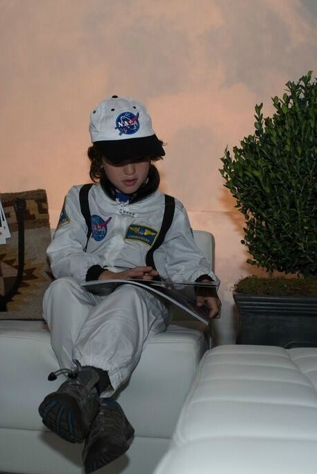 The Intergalactic Journey Home: A quiet moment checking out the new personalized kids' book
