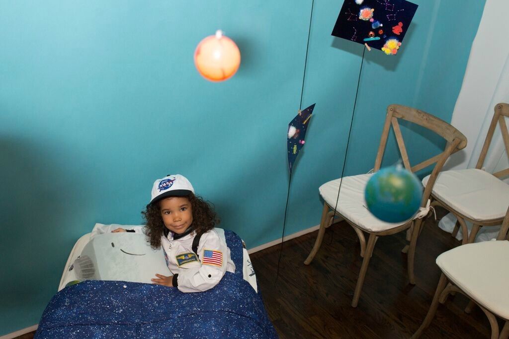 Ready for a bedtime story at the Incredible Intergalactic Journey Home book launch party | Cool Mom Picks