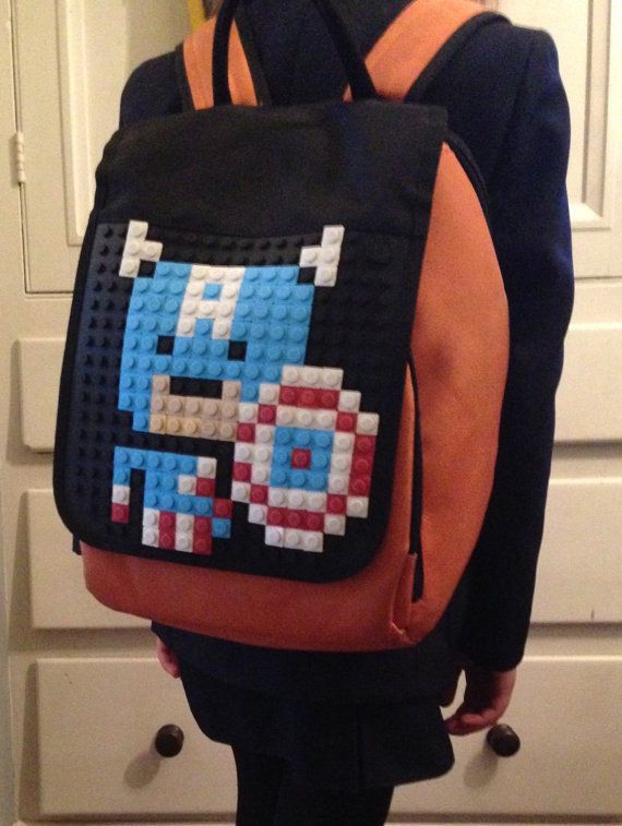 Custom pixel art backpacks using LEGO to create your favorite character 
