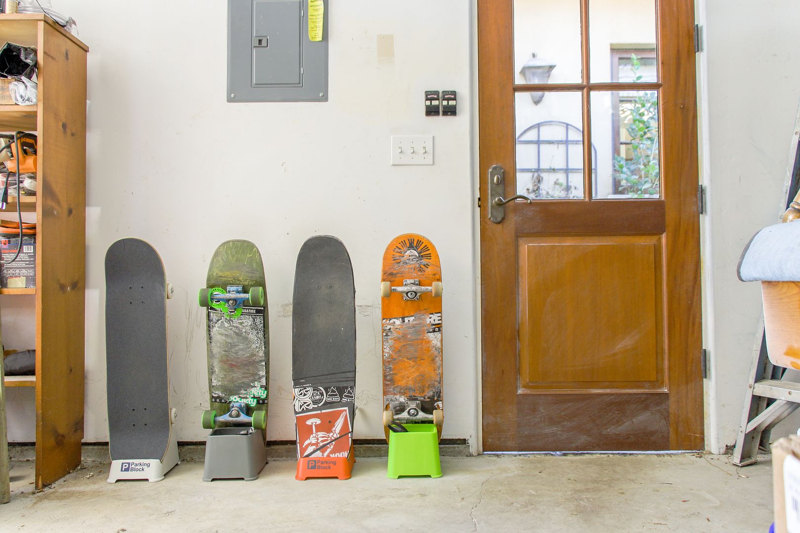 The Parking Block: A brand new skateboard stand that keeps boards safely off the floor, with wheels off the wall too.