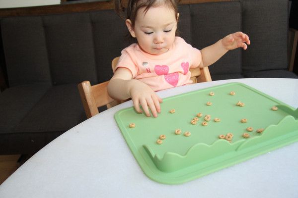 Cool silicone toddler trays that keep food (and bowls) where they're supposed to be. 