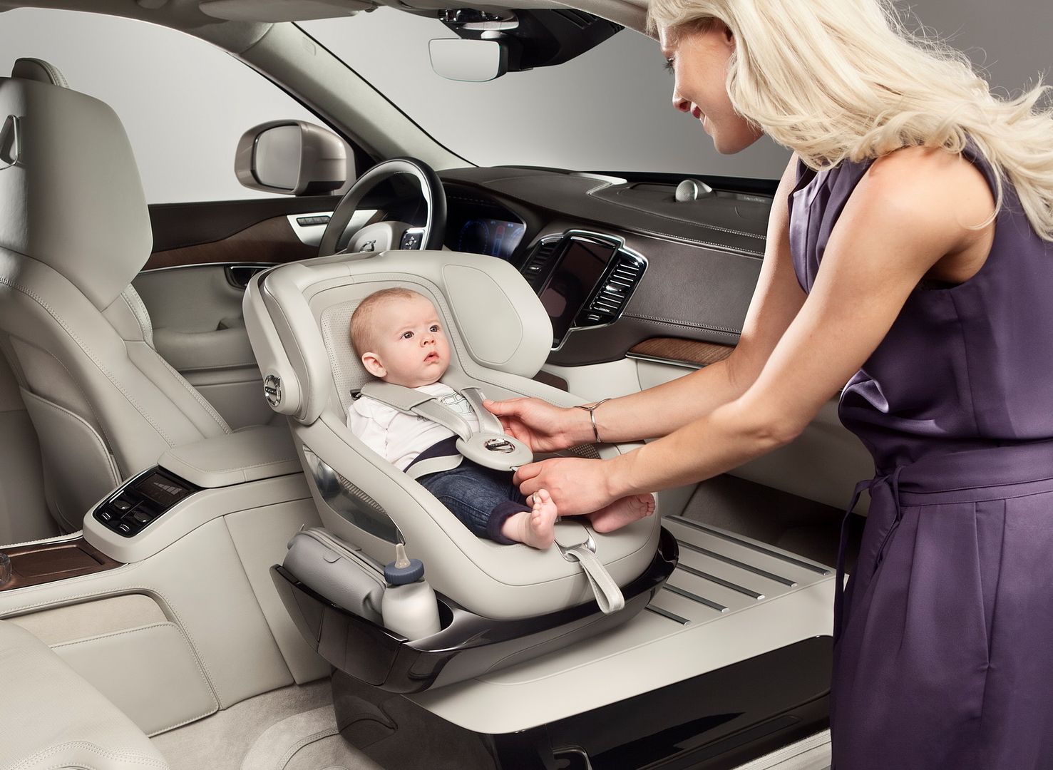 Volvo's child seat concept: The built-in seat lets the baby sit rear facing in the front, for eye contact with the other passengers