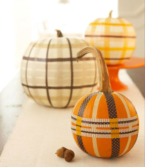 Easy no-carve pumpkin ideas: Cool washi tape plaid effect via Good Housekeeping