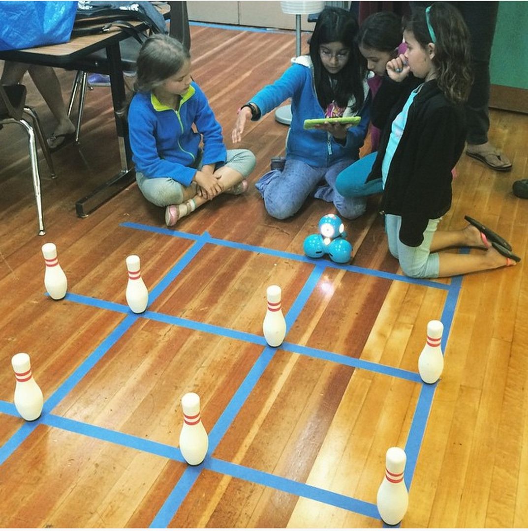 Coding projects for kids: Set up challenges like programming Dot and Dash to knock down bowling pins