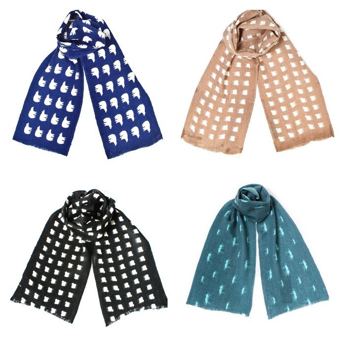 Fair trade soft wool scarves for kids with animal prints by Mia Berglund
