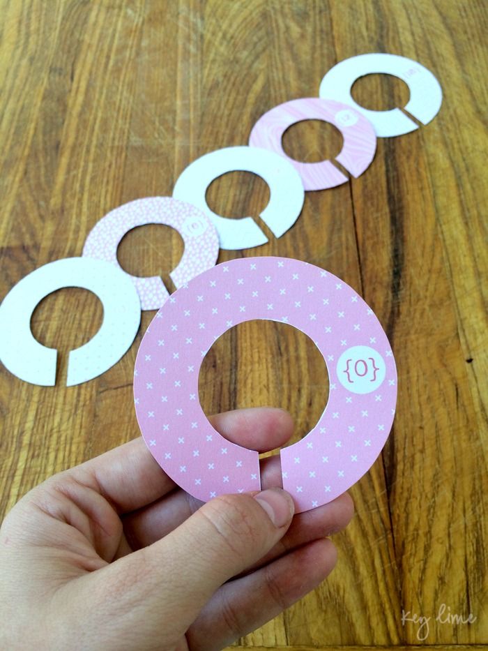 Decluttering tips for kids rooms: Free printable closet dividers can keep things organized and let kids know where to put things away by size or by season