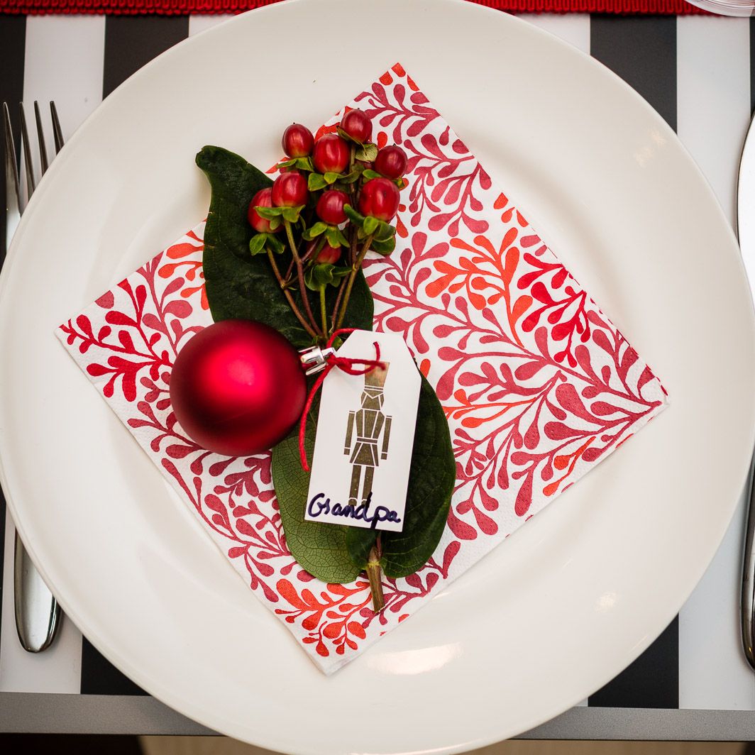 Holiday table setting idea: Fresh greens with an ornament place card