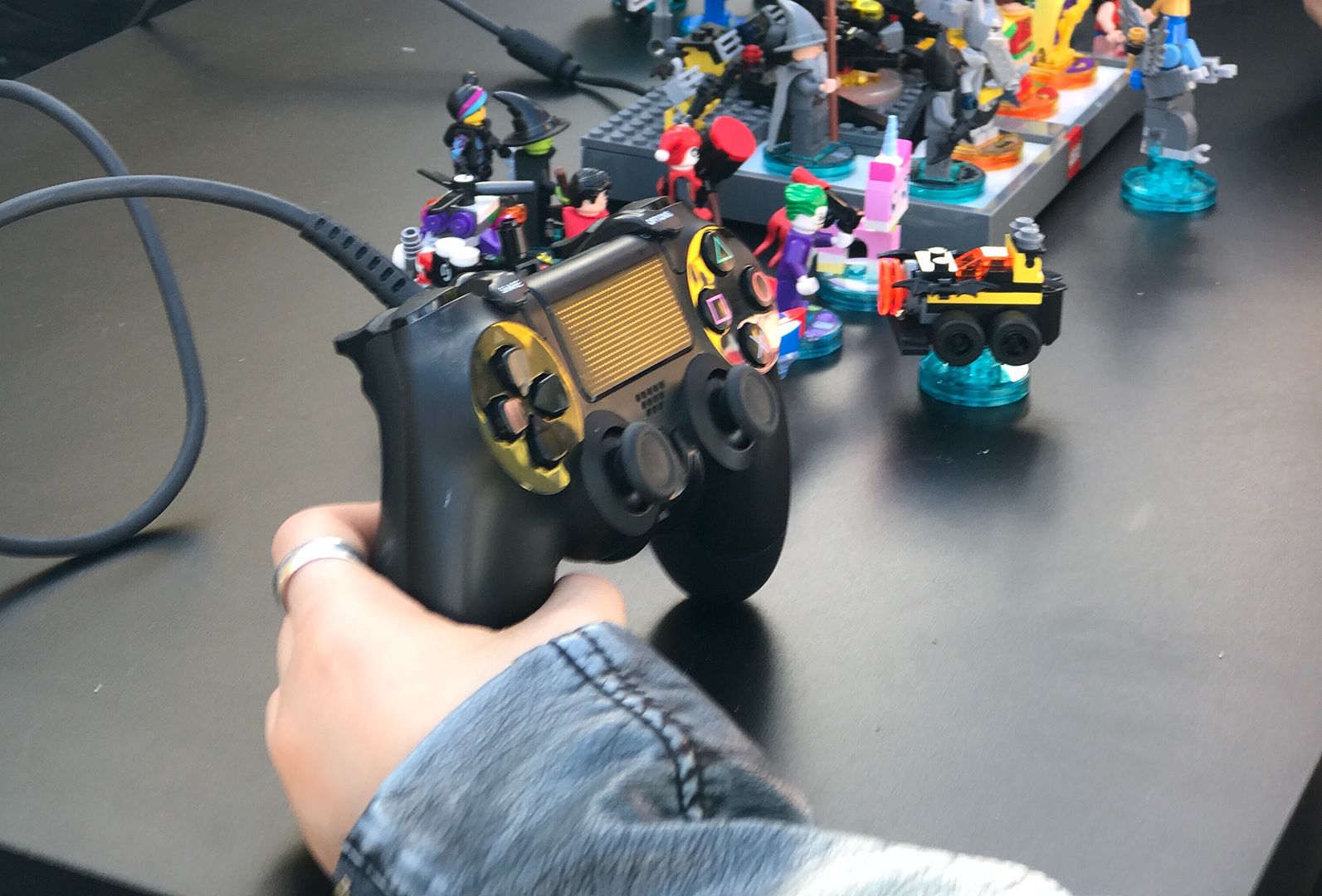 LEGO Batman Movie Premiere: video game controller with minifigs attached. Nice touch!