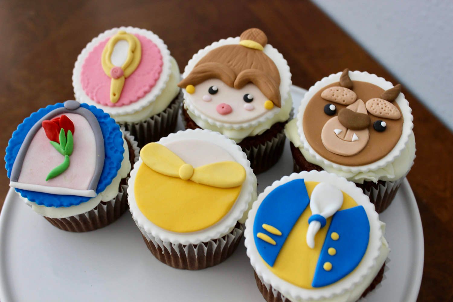 Beauty and the Beast fondant cupcake toppers from NerdBytes: Wow! 