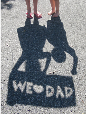 Creative kid portrait ideas: How to make a we love dad silhouette photo via crafty gator | father's day gift ideas