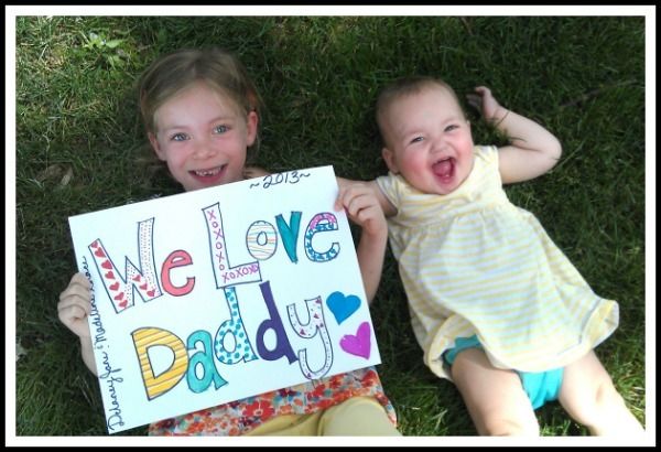 Father's Day photo shoot idea: Combine kids and their own artwork | Evolving Motherhood