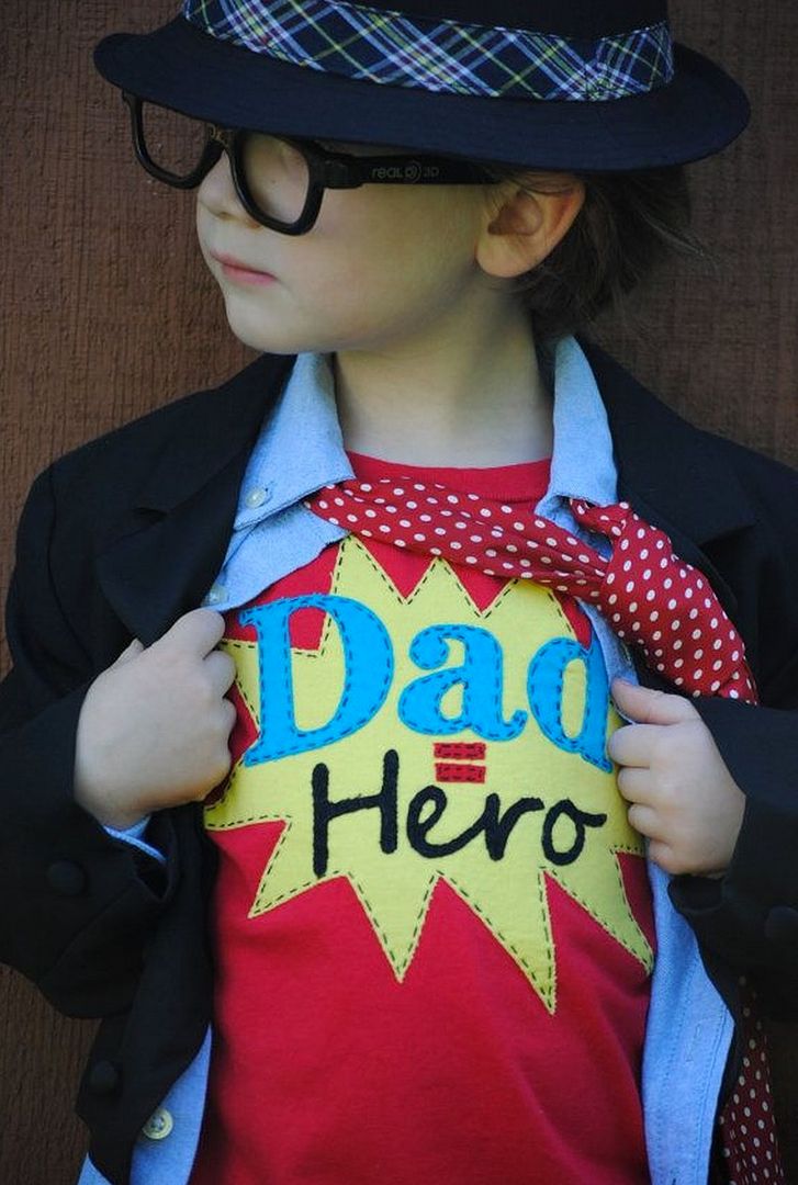 Creative kid portrait ideas for Father's Day: Dress your kids up in a t-shirt with just the right sentiment like this Dad = Hero tee from Once Upon a Story on Etsy
